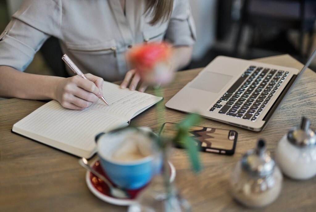 woman taking notes